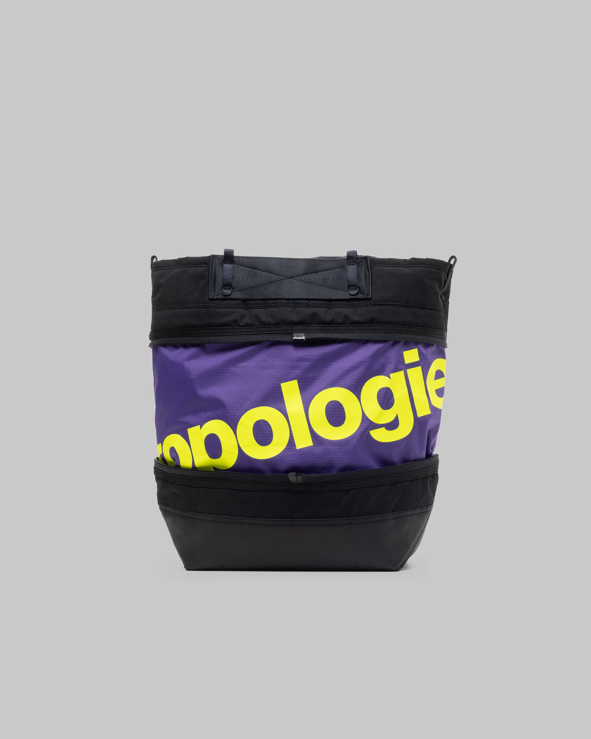 Convert Tool Bag in purple ripstop with black top and base and a large neon yellow topologie logo, shown against a light grey background.