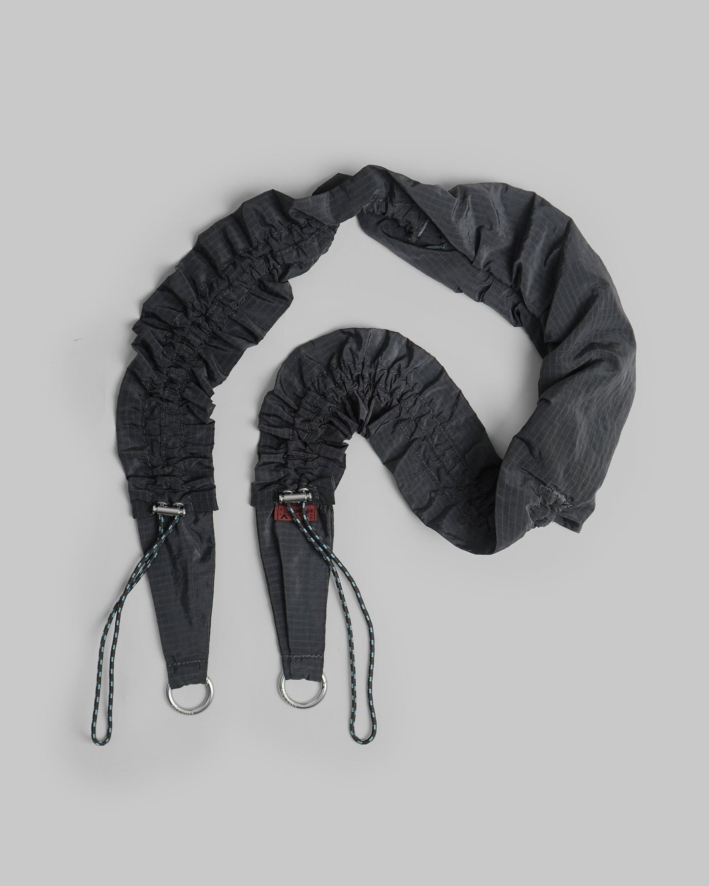 Scrunchie Pocket Sling – Topologie