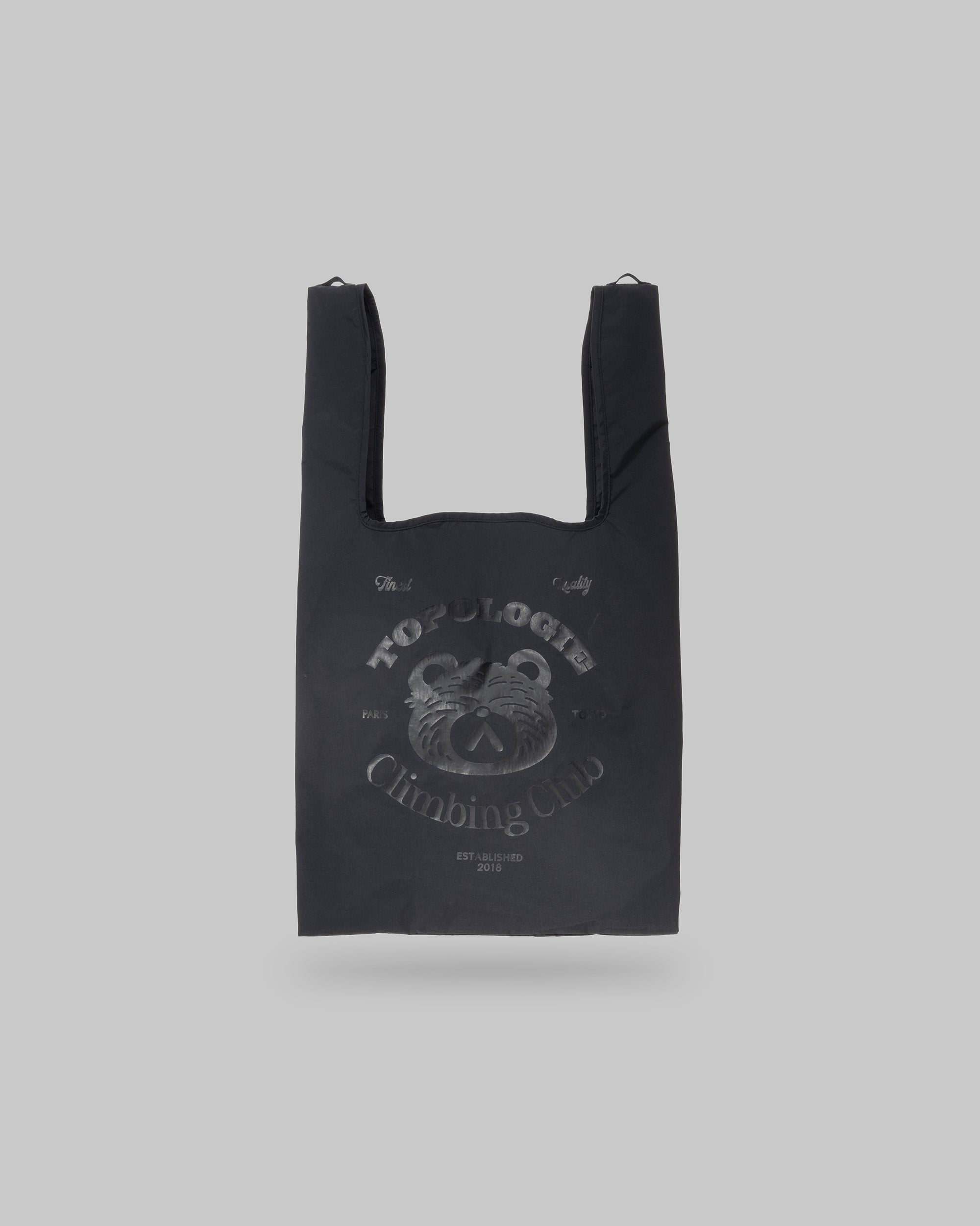 Konbini Bag in black synthetic fabric with a tonal glossy Climbing Club bear logo graphic, shown against a light grey background.