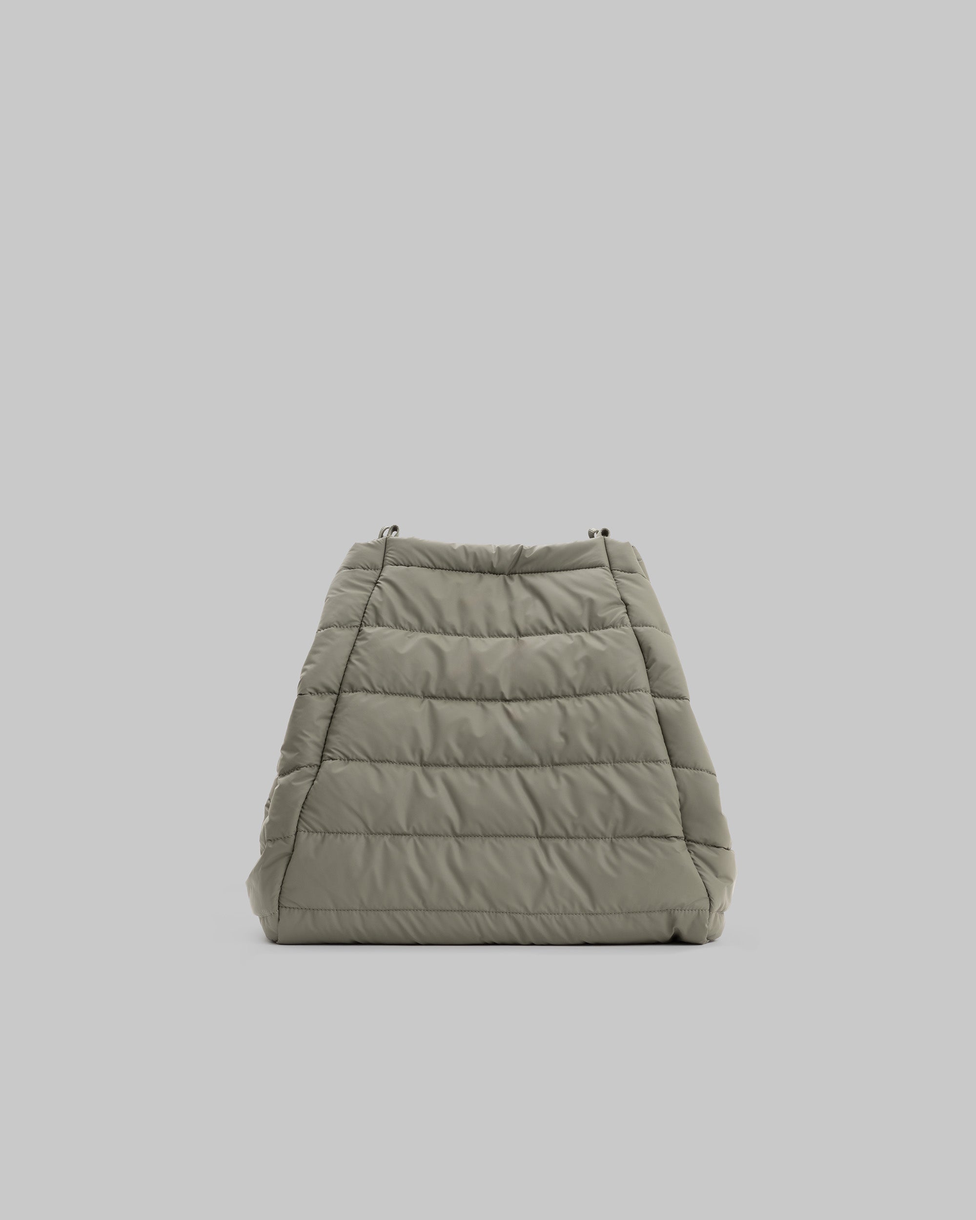 Marche Tote Large in a light olive green quilted material, shown against a plain grey background.