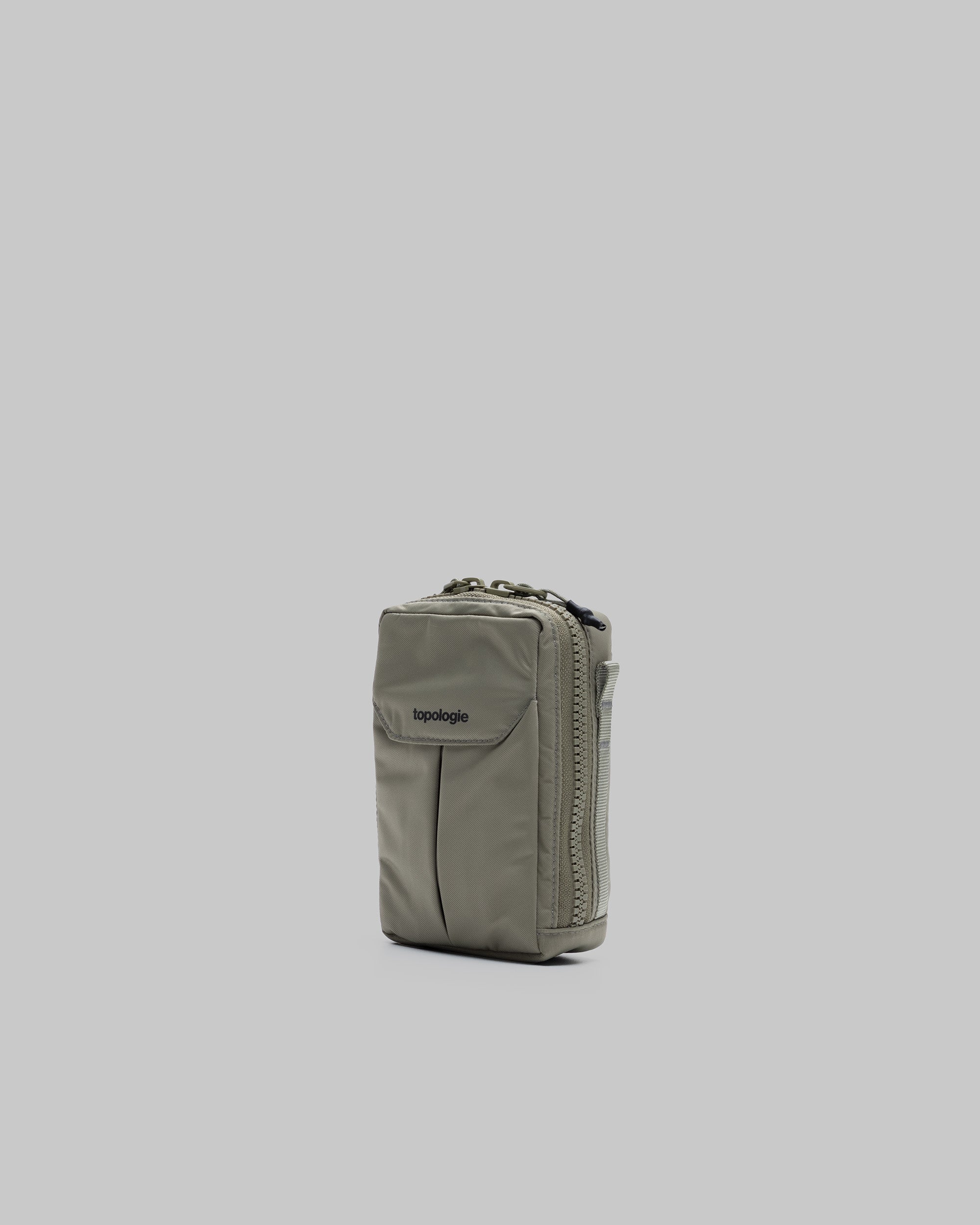 Utility Phone Sacoche in Moss olive green with a black topologie logo on the flap, shown against a light grey background.